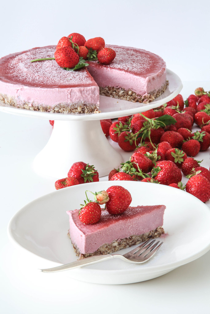 A slice of frozen strawberry cashew cake